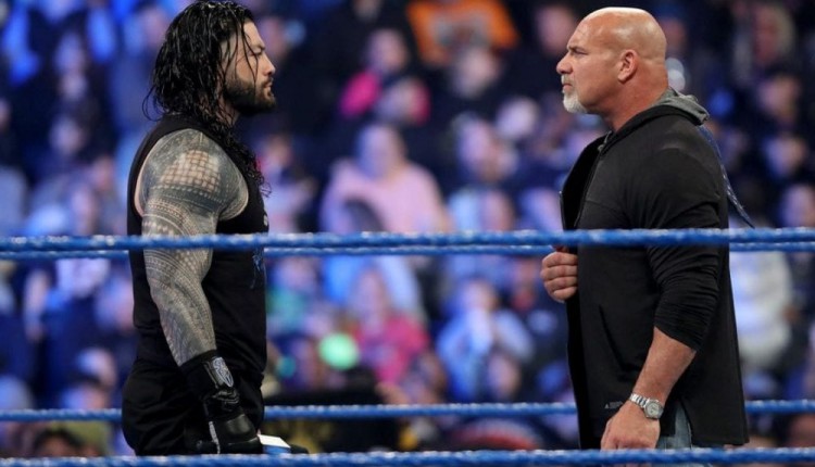 Roman Reigns reacts after being called out by Goldberg